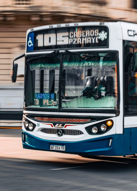 A public bus with route 105 in motion on a city street. Vibrant urban transport.