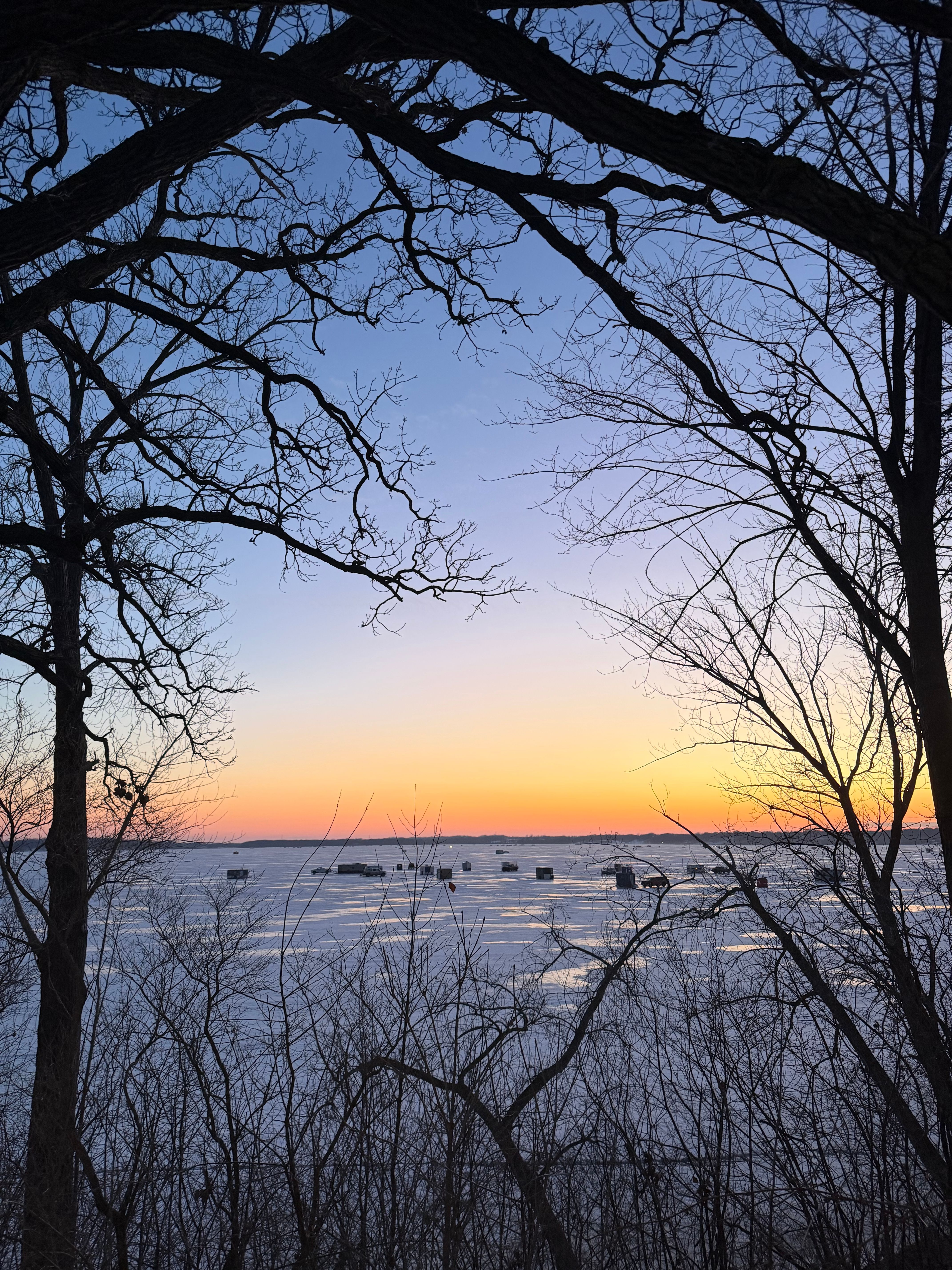 Tranquil Winter Sunset Over Frozen Lake · Free Stock Photo
