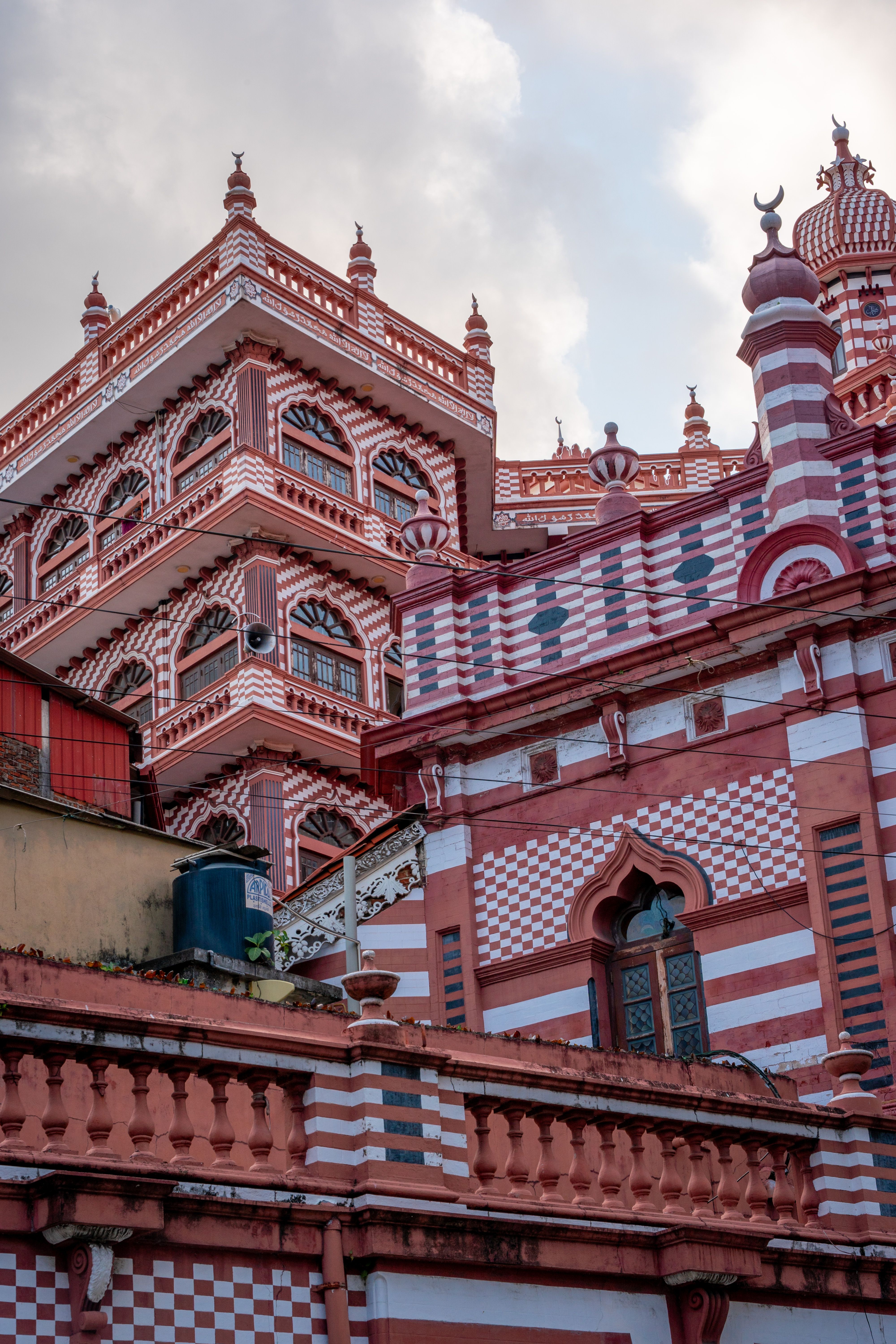 Stunning view of Jami Ul-Alfar Mosque's vibrant architecture in Colombo, Sri Lanka.