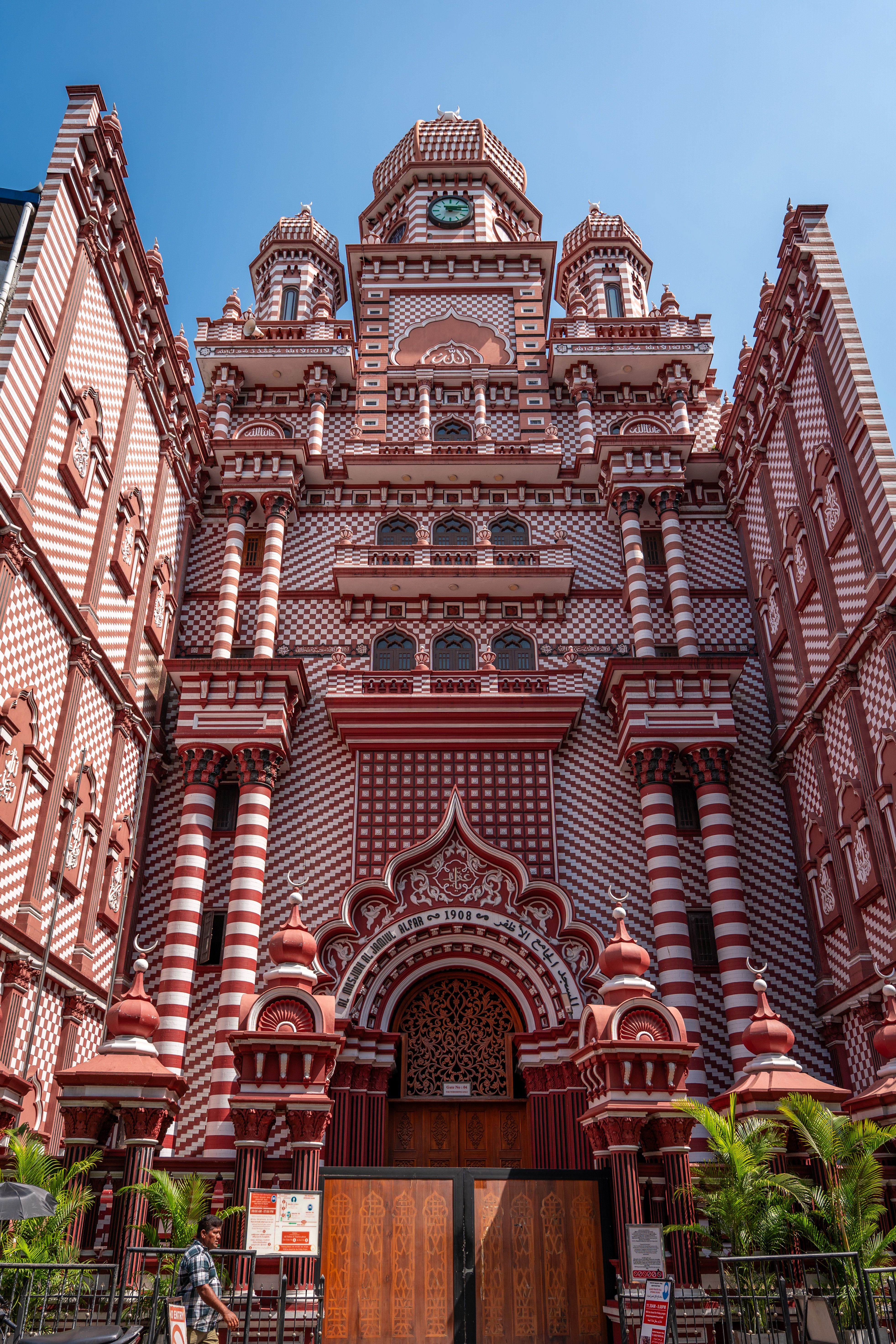 Stunning facade of the Red Mosque in Colombo with intricate Islamic architectural details.