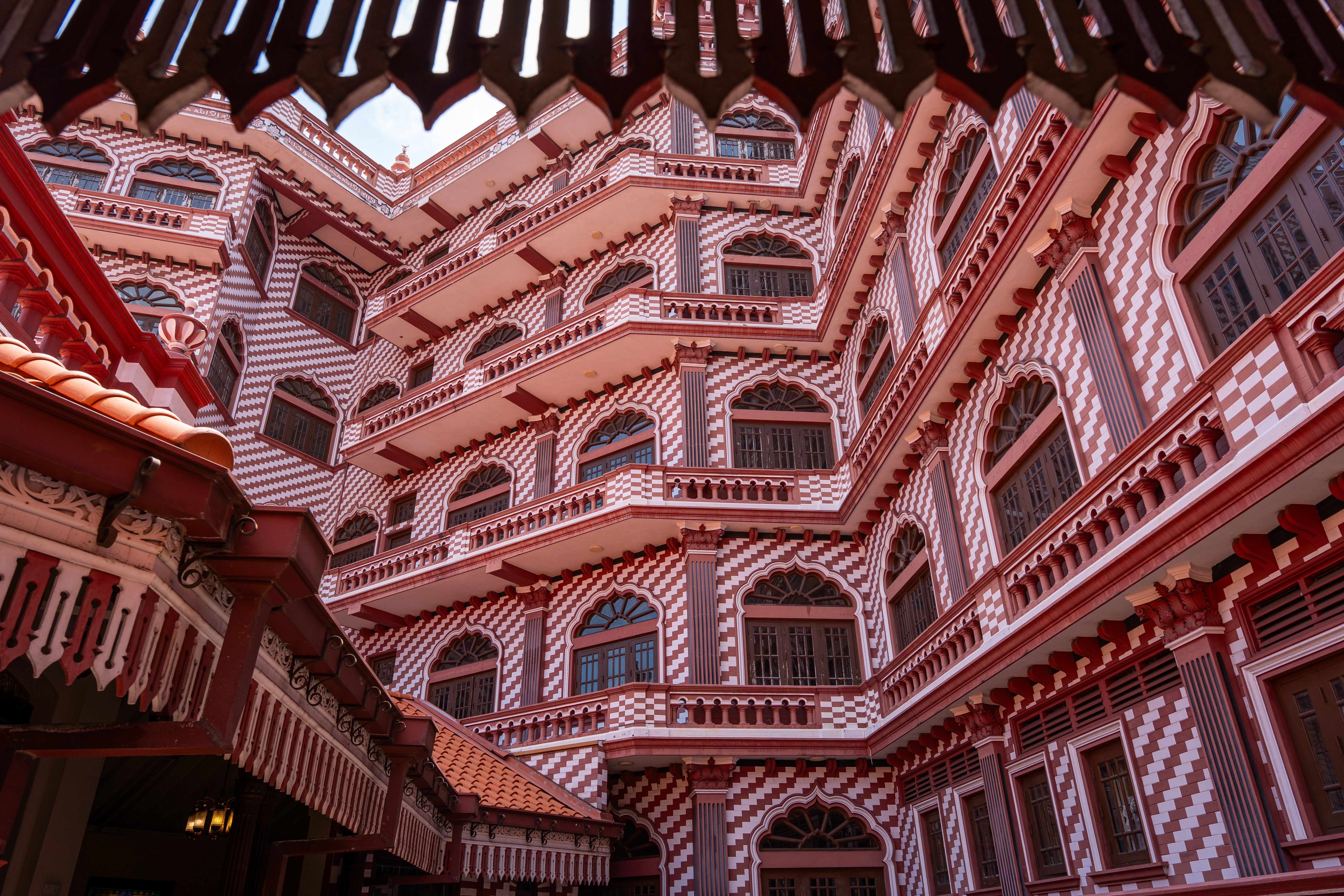 Explore the unique red and white Islamic architecture in the heart of Colombo, Sri Lanka.