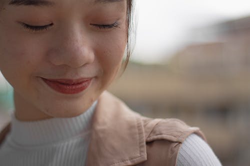 Free Close-Up Photo of Smiling Woman Stock Photo