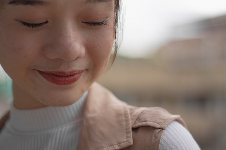 Close-Up Photo Of Smiling Woman