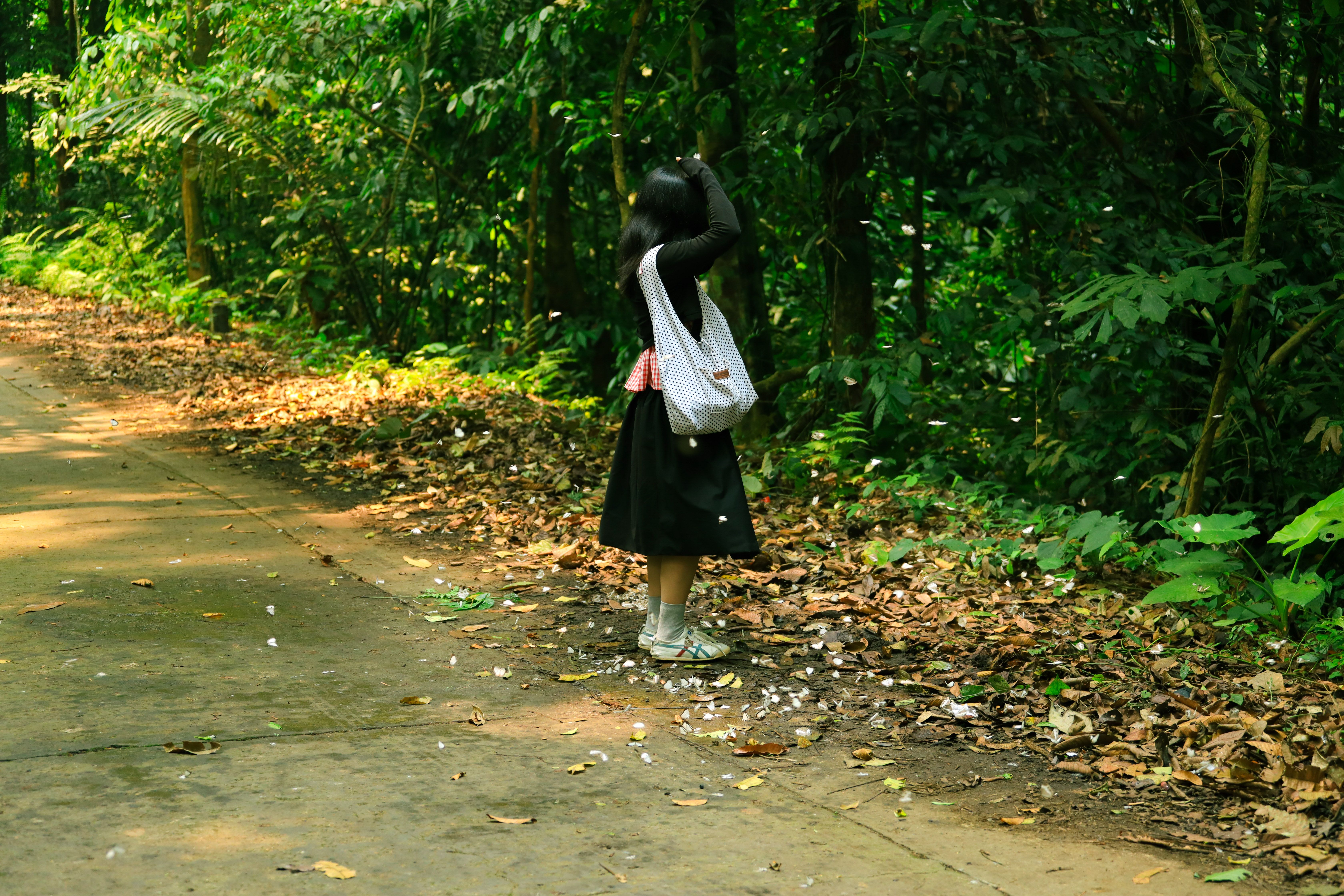 Young Girl Walking in Ninh Bình Forest · Free Stock Photo