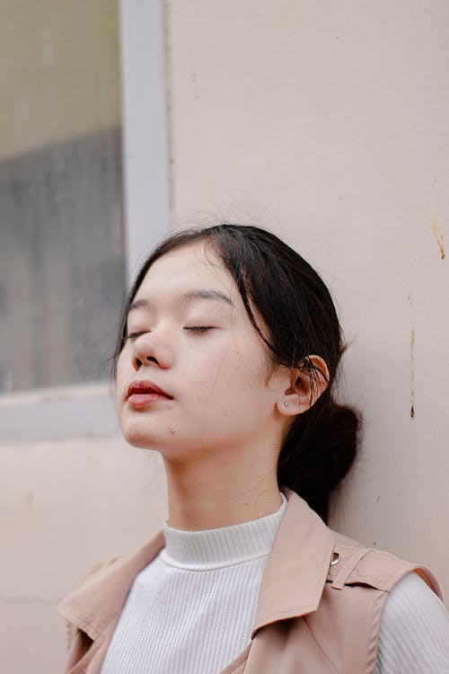 Безкоштовне стокове фото на тему «азіатська жінка, вираз обличчя, впритул»