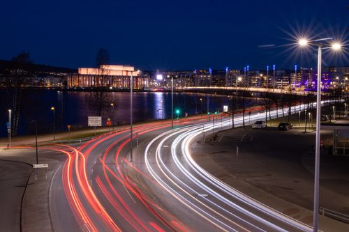 Free Dynamic light trails with vibrant cityscape in Jönköping, Sweden at night. Stock Photo