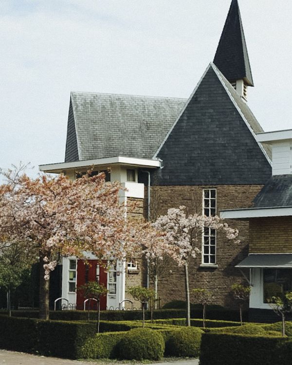 Church In Springtime Charming Church with Blossoming Trees in Spring ยท Free Stock Photo