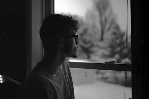 Gray Scale Photography on Man Wearing Eye Glasses