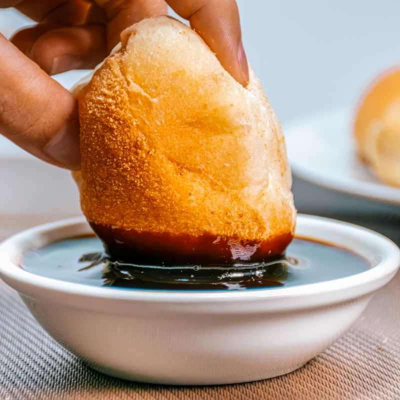 Coconut Bread Pudding Puff with Dark Rum Sauce