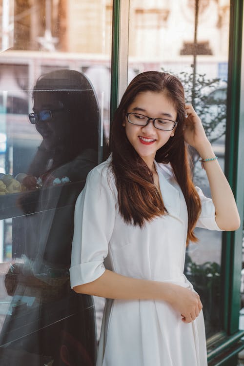 Woman in White Button Up Shirt Dress Smiling