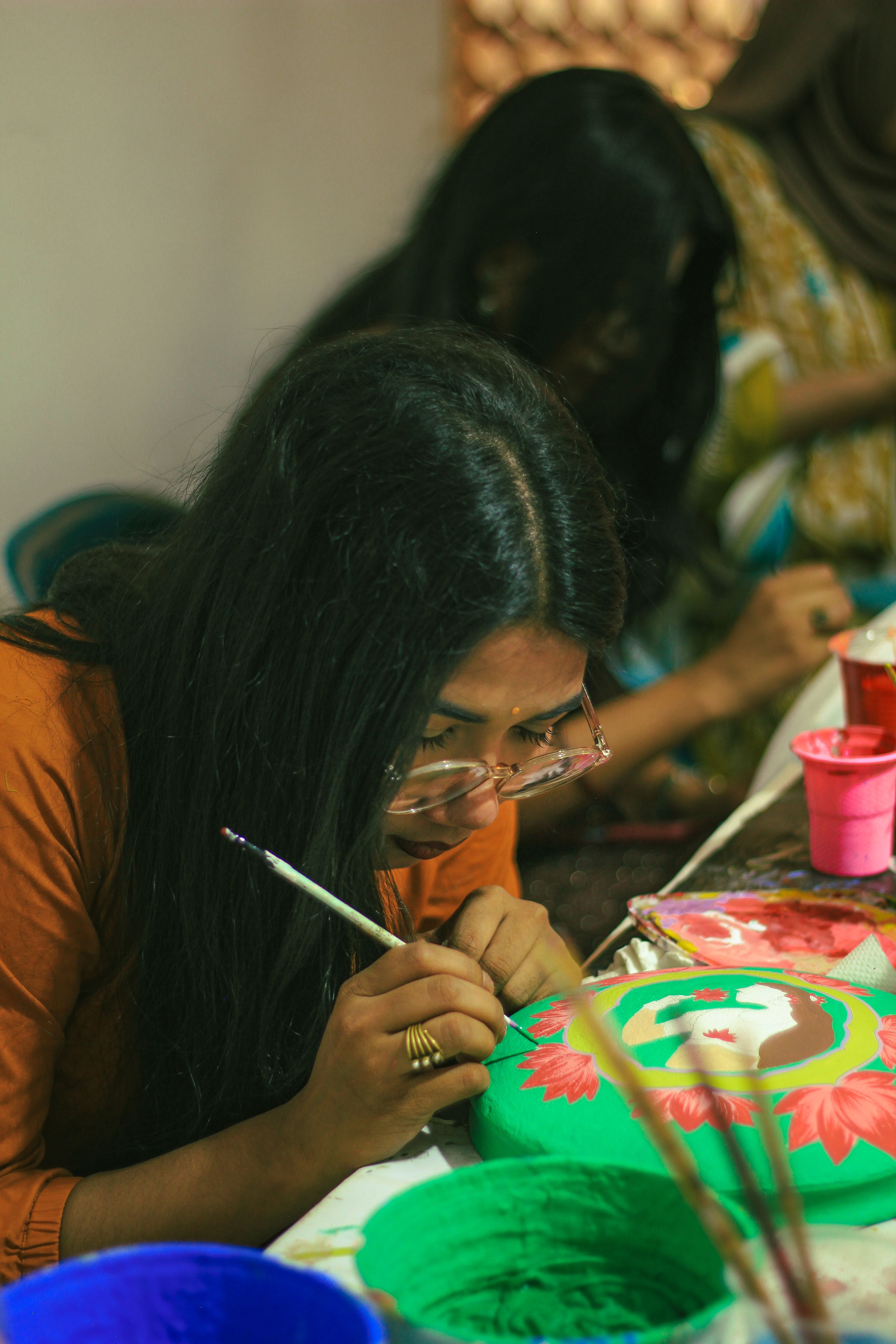 Woman Painting Traditional Motif in Dhaka Art Studio · Free Stock Photo