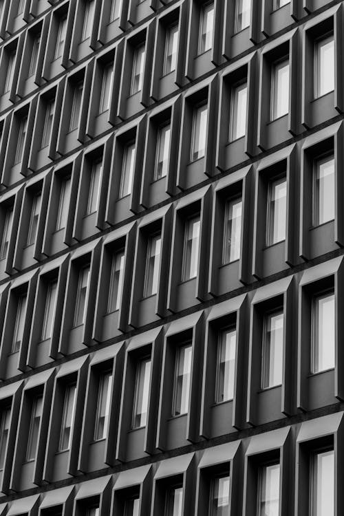 Grayscale Photo of Concrete Building