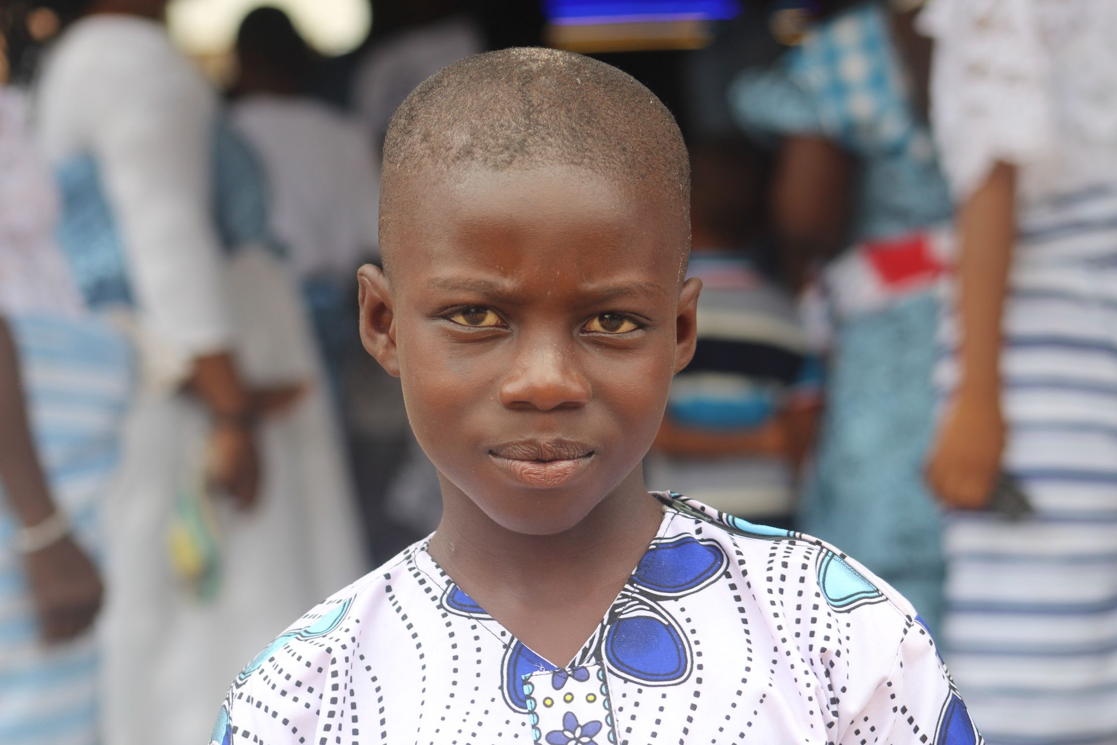 Authentic Boy Portrait of a Young Boy in Traditional Attire · Free Stock Photo