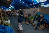Capture of a bustling local market in West Nusa Tenggara, Indonesia, showcasing daily life.