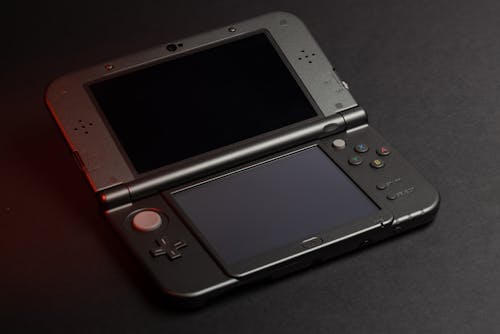 Free Black Nintendo Game Boy on Black Textile Stock Photo