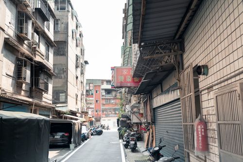 Free Exploring a narrow alley in Taipei City, showcasing urban architecture and daily life. Stock Photo
