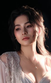 A serene portrait of an adult woman in gentle lighting, showcasing elegance and grace.