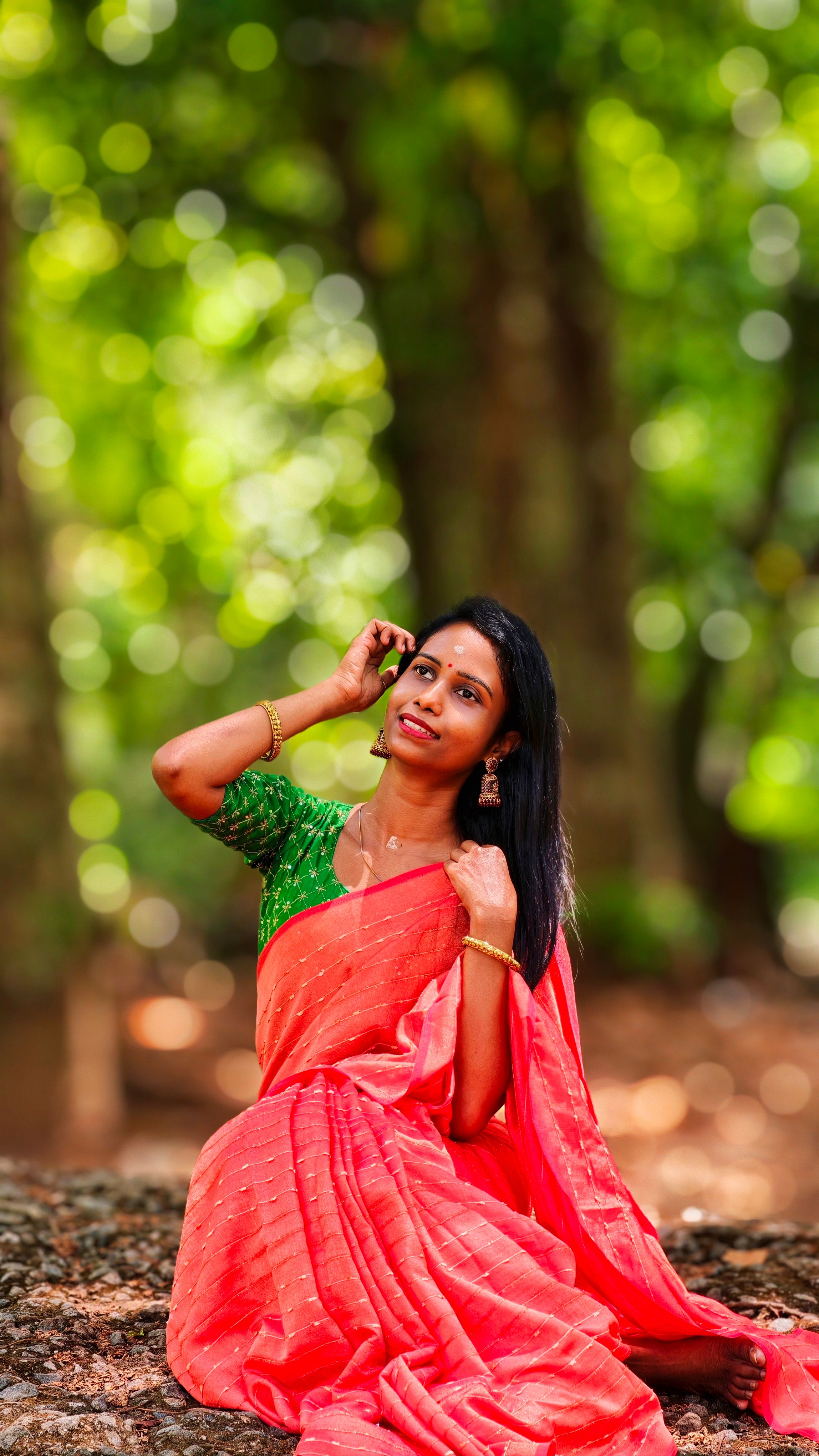 Serene Indian Woman in Traditional Saree Outdoors · Free Stock Photo