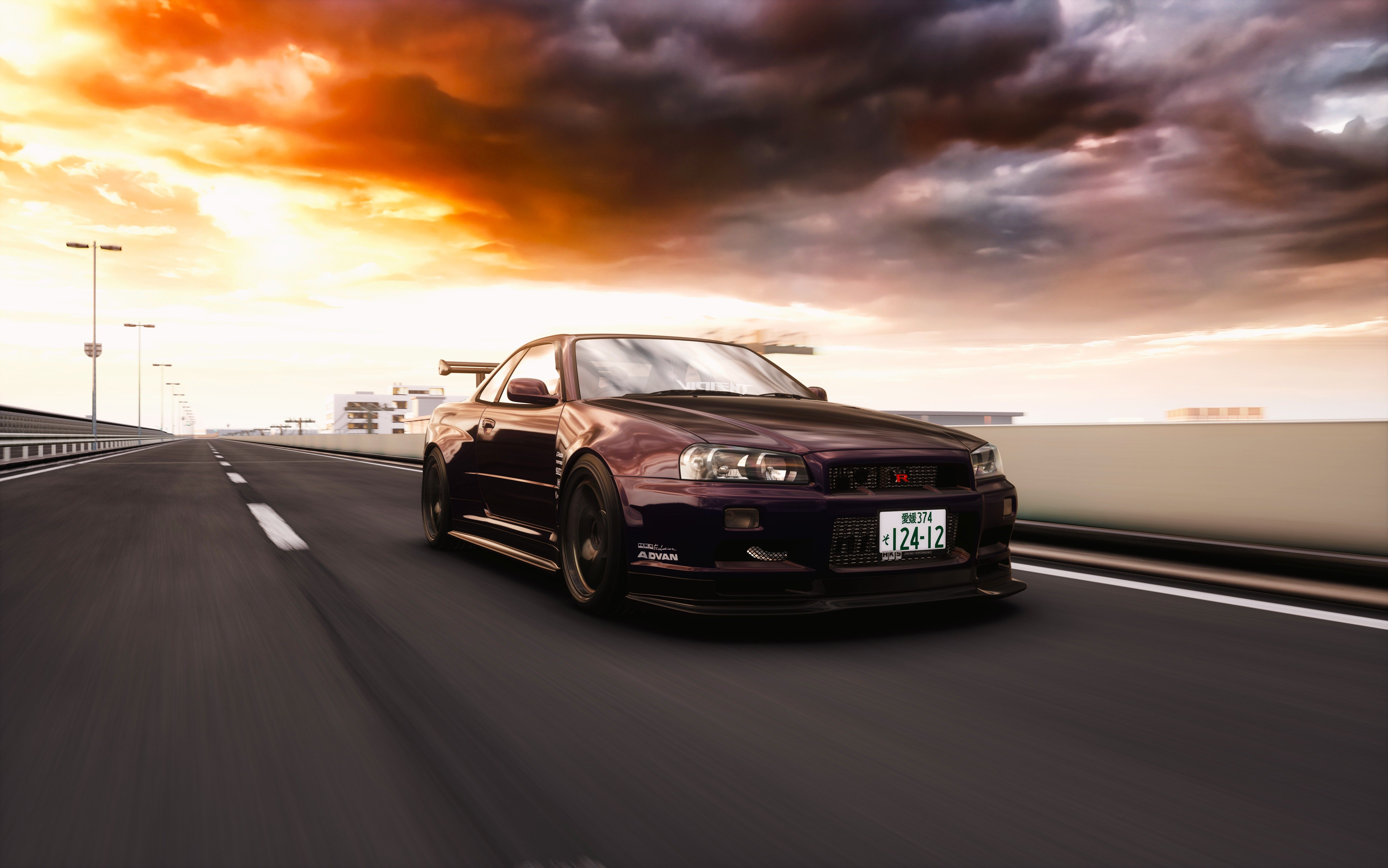 Nissan Skyline R34 Driving on Pippu Highway at Sunset · Free Stock Photo