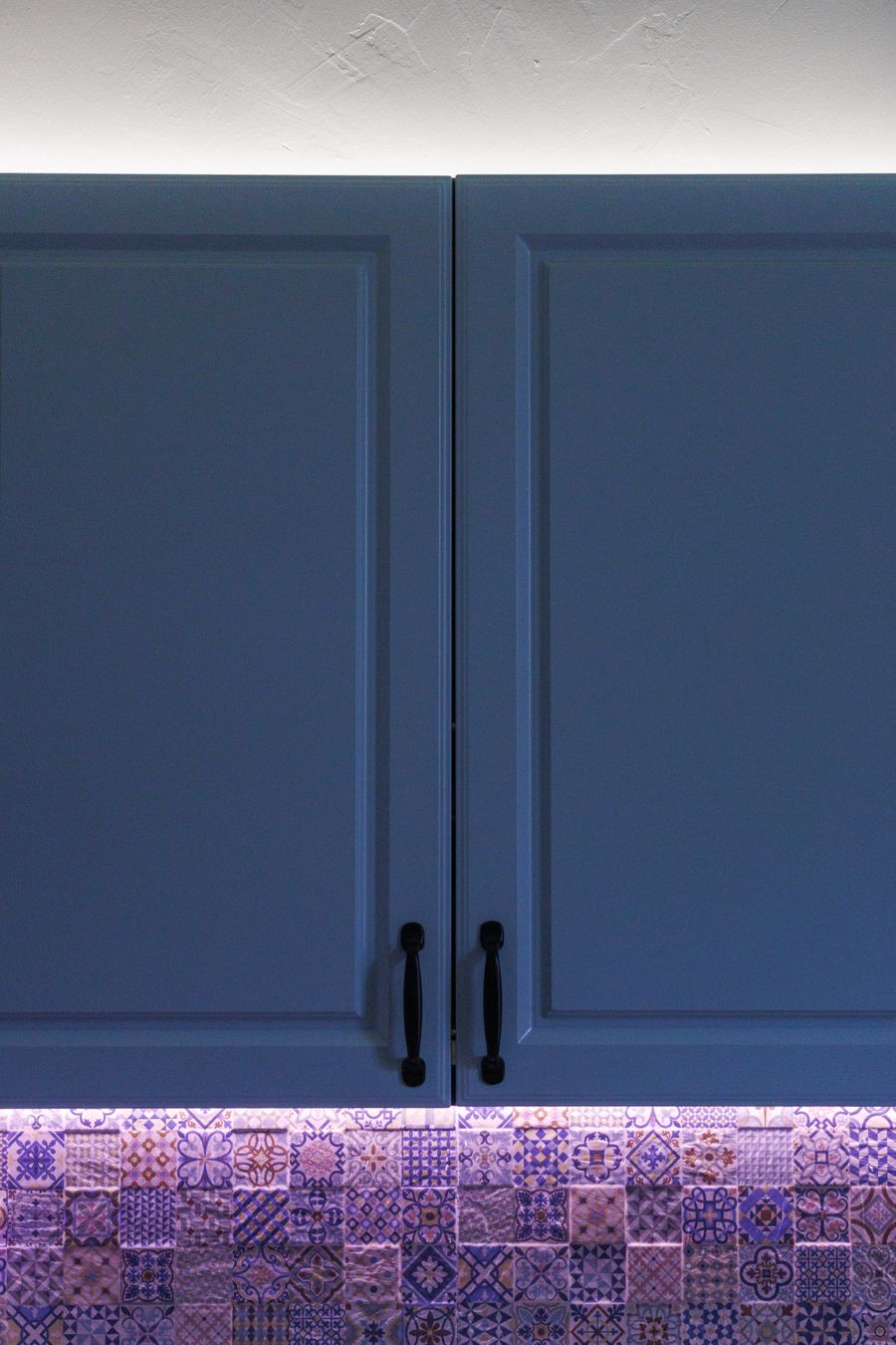 Refinished blue kitchen cabinets
