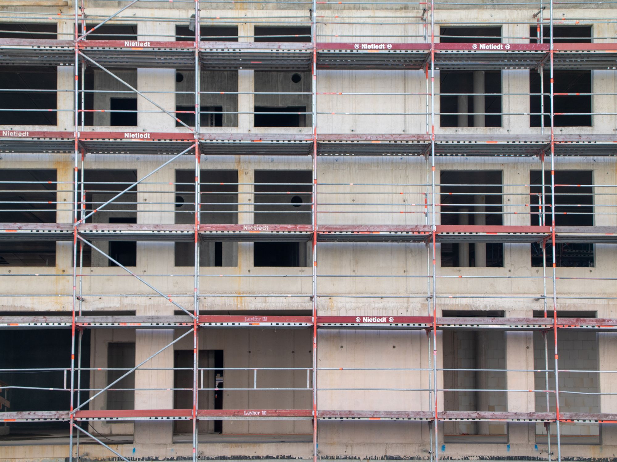 Exterior Painting in Finsbury Park, Islington — painter refreshing a house exterior in weatherproof paint
