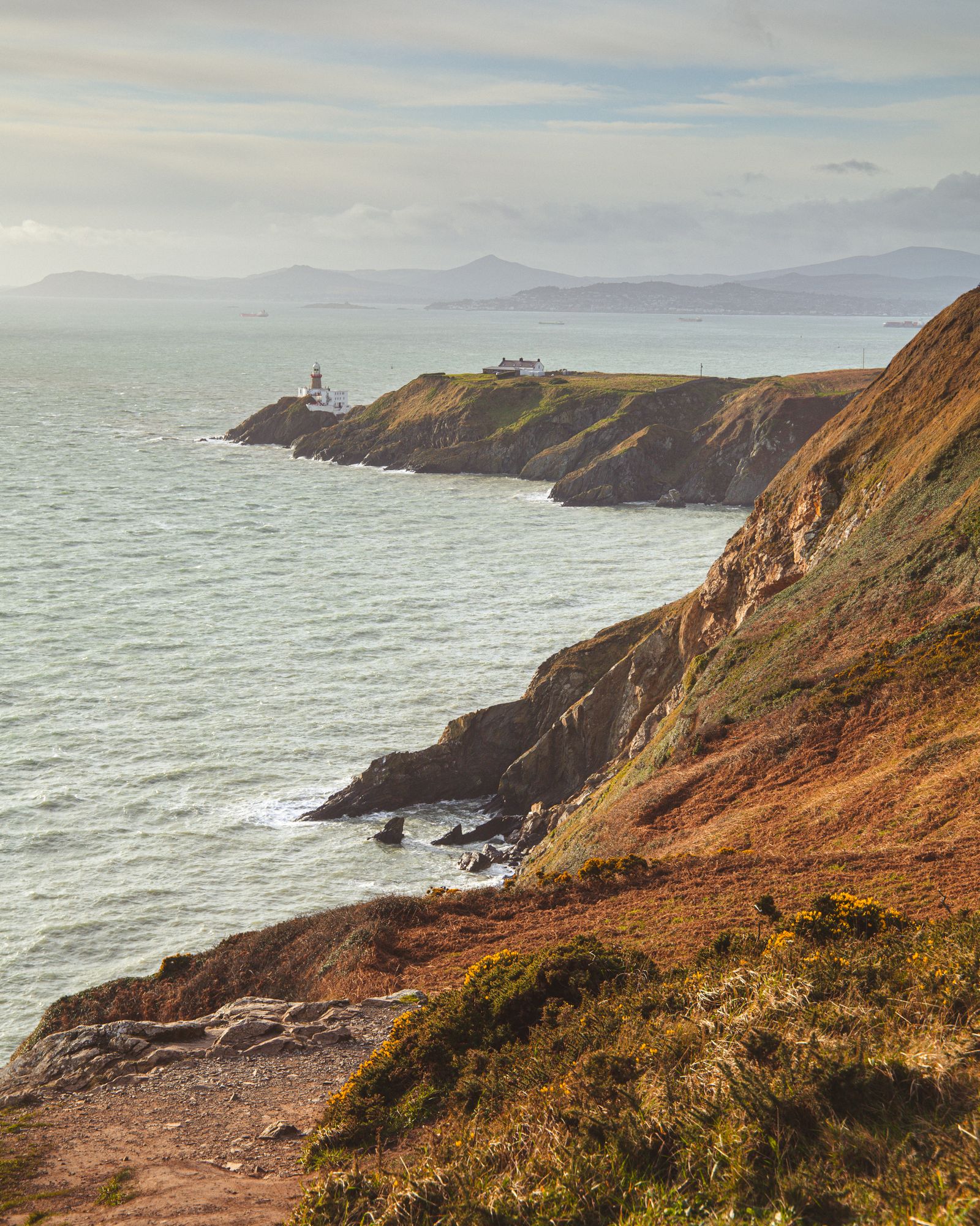 Howth Head cliffs and lighthouse on the Dublin coast