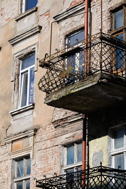 Free An old, weathered balcony on a historic building in Sovetsk, Russia. Stock Photo