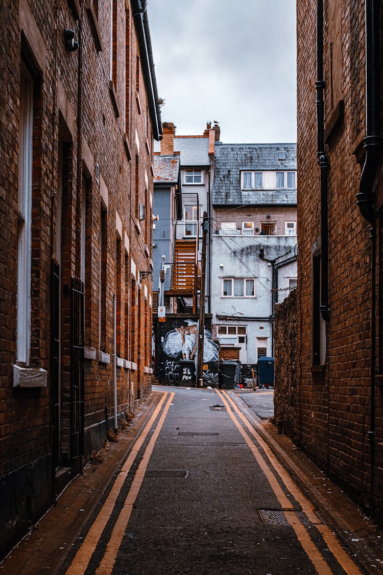 Brown Brick Building Beside Road