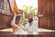 Man in White Dress Shirt and Woman in White Tube Dress