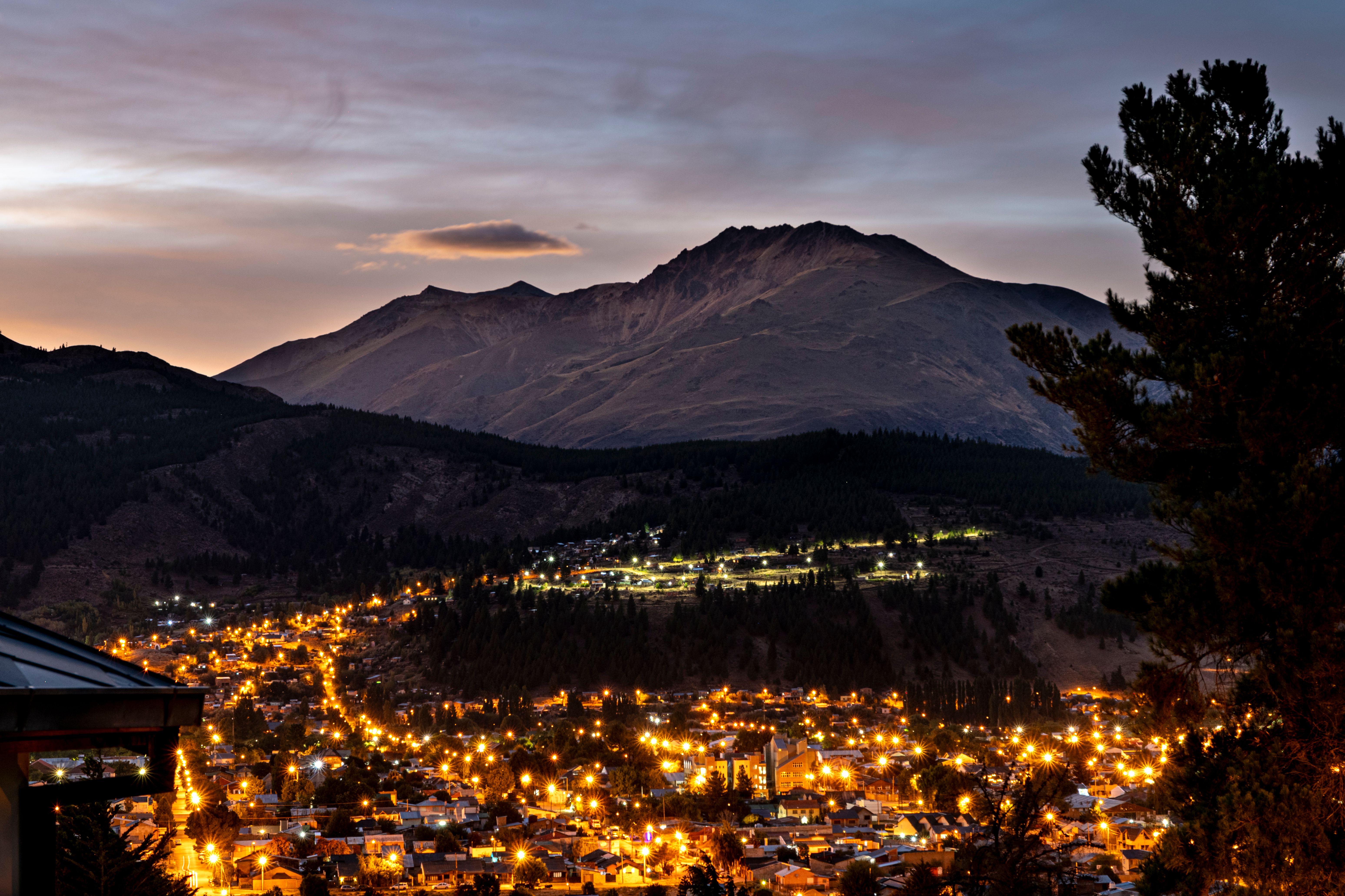 Incredible 2hr Scenic Milford Sound Flight with Landing - 201 Review: The Ultimate Fiordland Adventure Review 2026 - Vibrant night view of Esquel, Argentina, with illuminated cityscape and mountain backdrop.