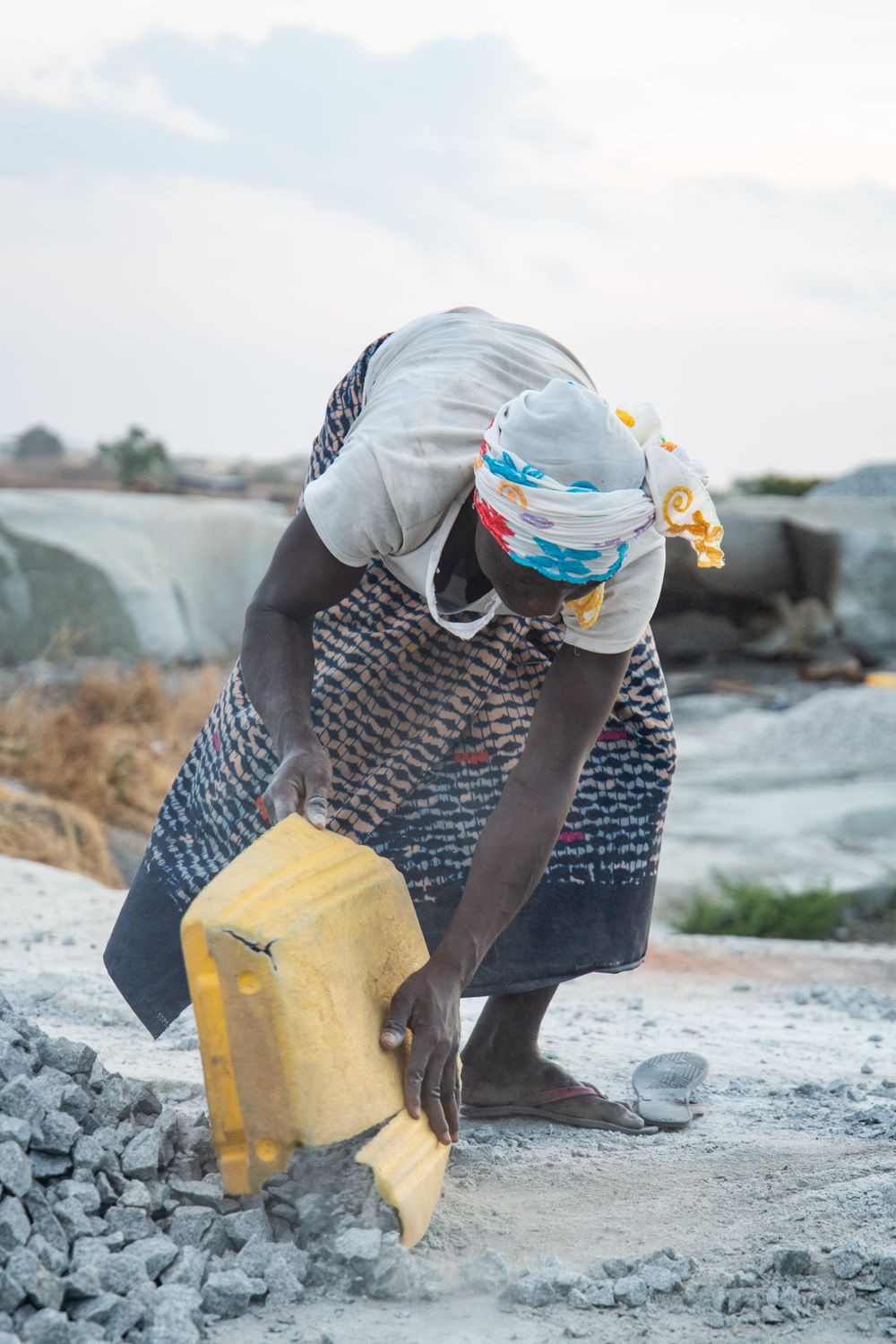 Laborring African Woman Laboring in Quarry Setting · Free Stock Photo