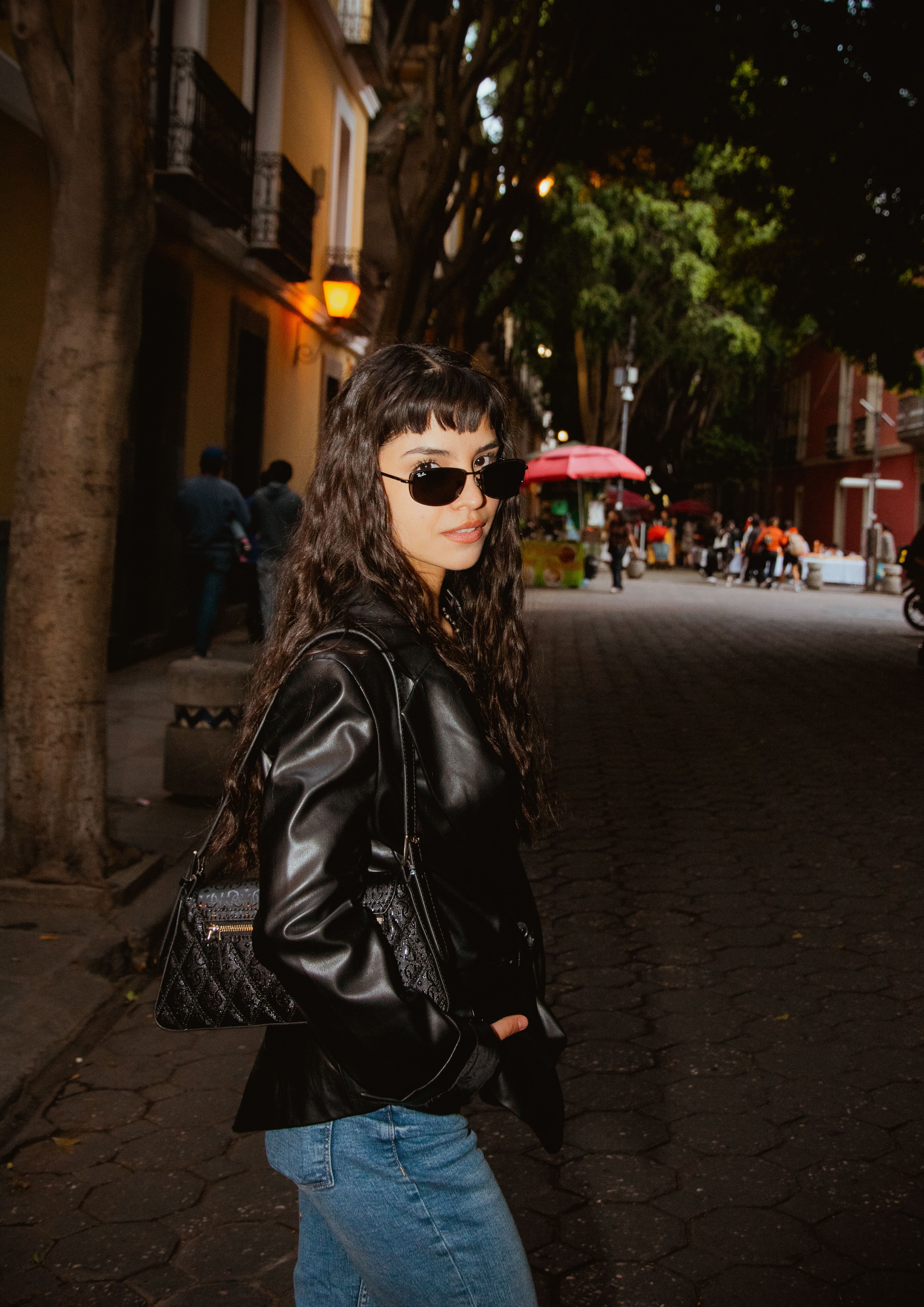 Stylish Woman Walking in Urban Street Setting · Free Stock Photo