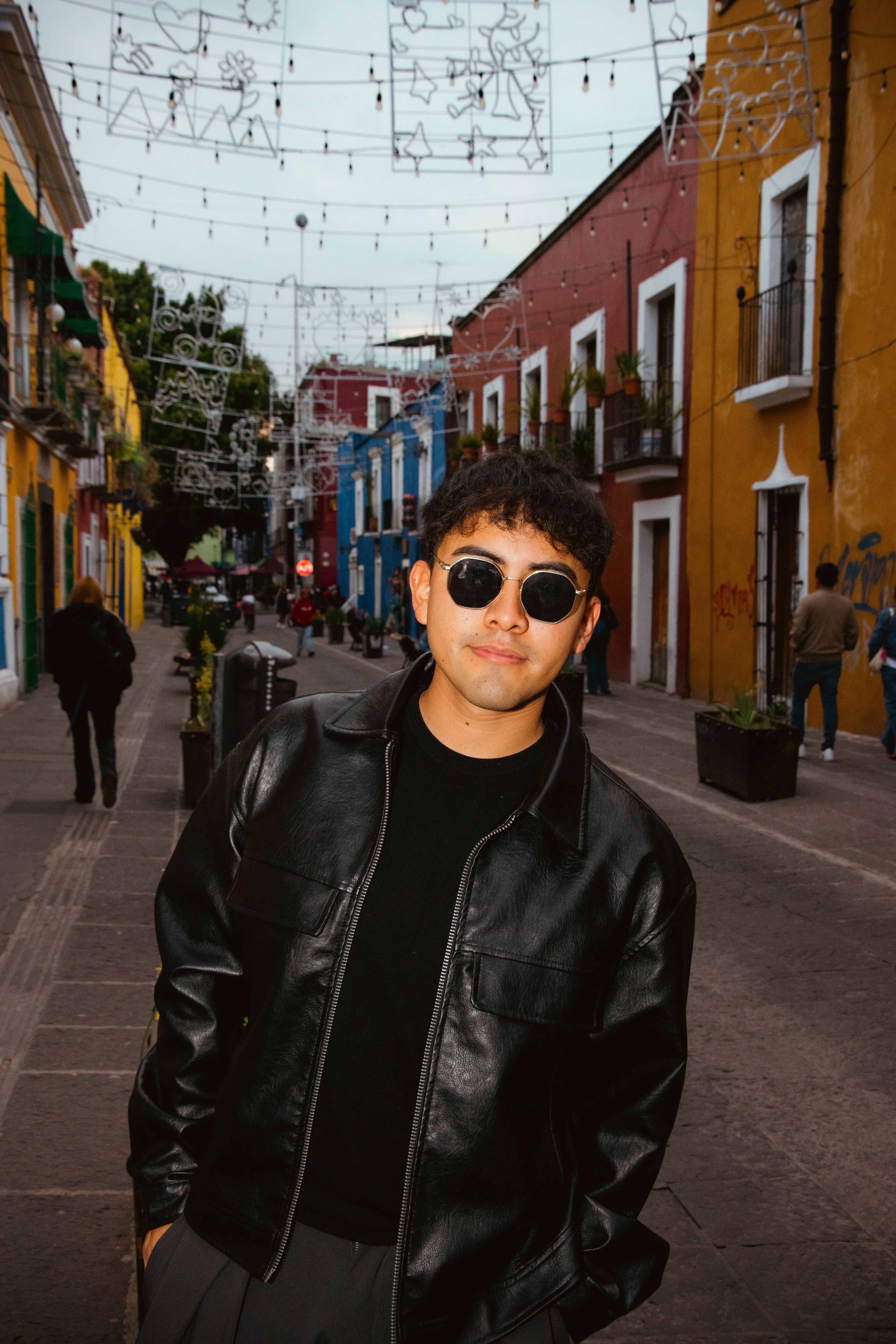 Stylish Young Man Posing on Urban Street · Free Stock Photo