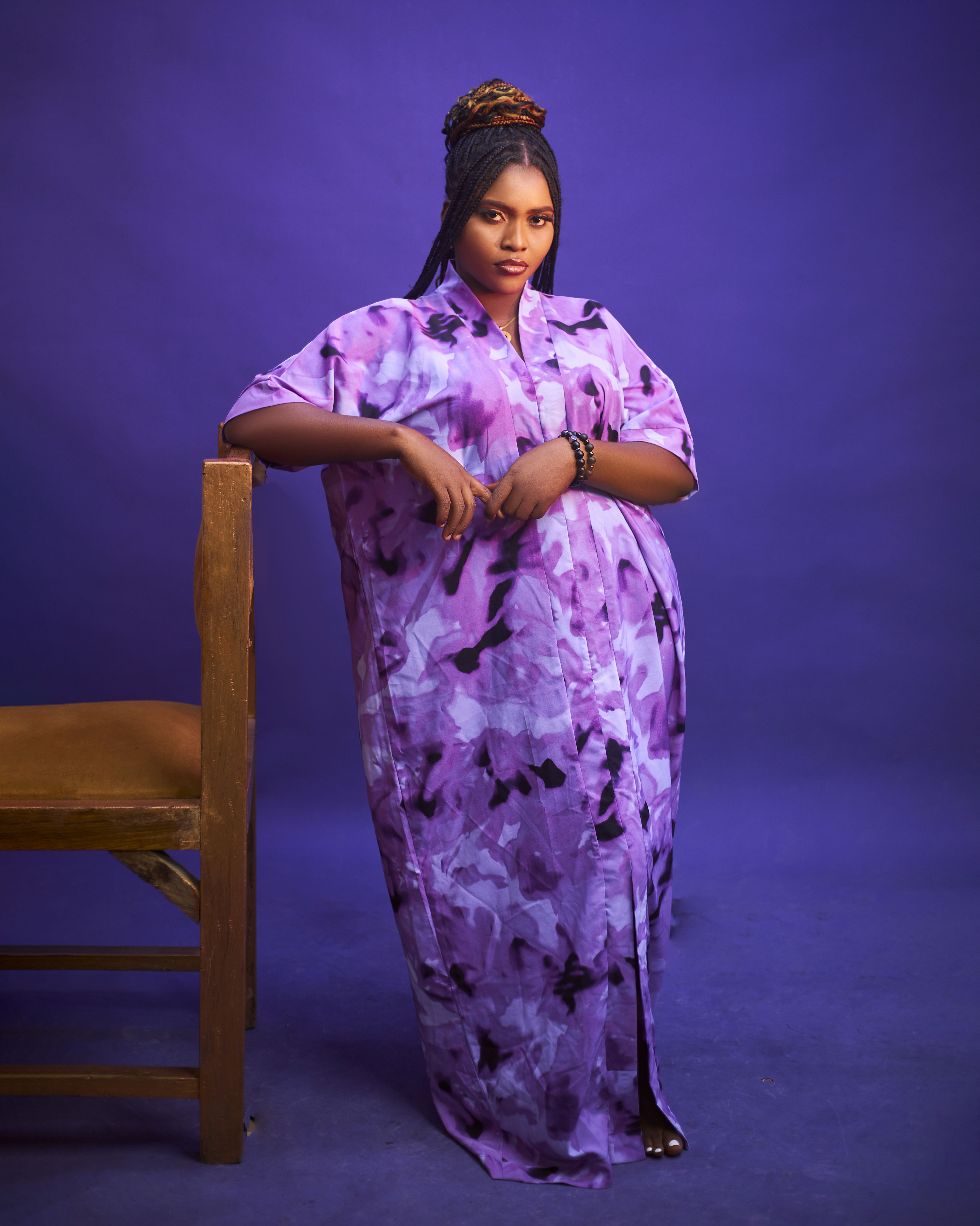 Elegant Portrait of Woman in Purple Dress · Free Stock Photo