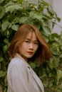 Young Woman with Red Lips Turning Around