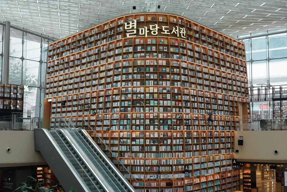 Seoul Samseong-dong COEX Starfield Library tall stacks reading travel