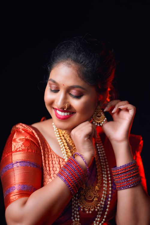 Free Beautiful Indian bride in vibrant sari and jewelry, showcasing cultural elegance. Stock Photo