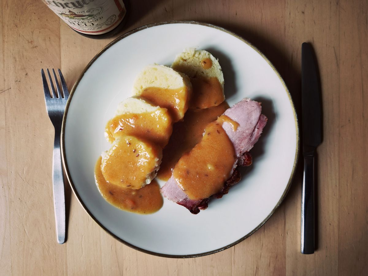 Traditional Czech meal with dumplings and pork