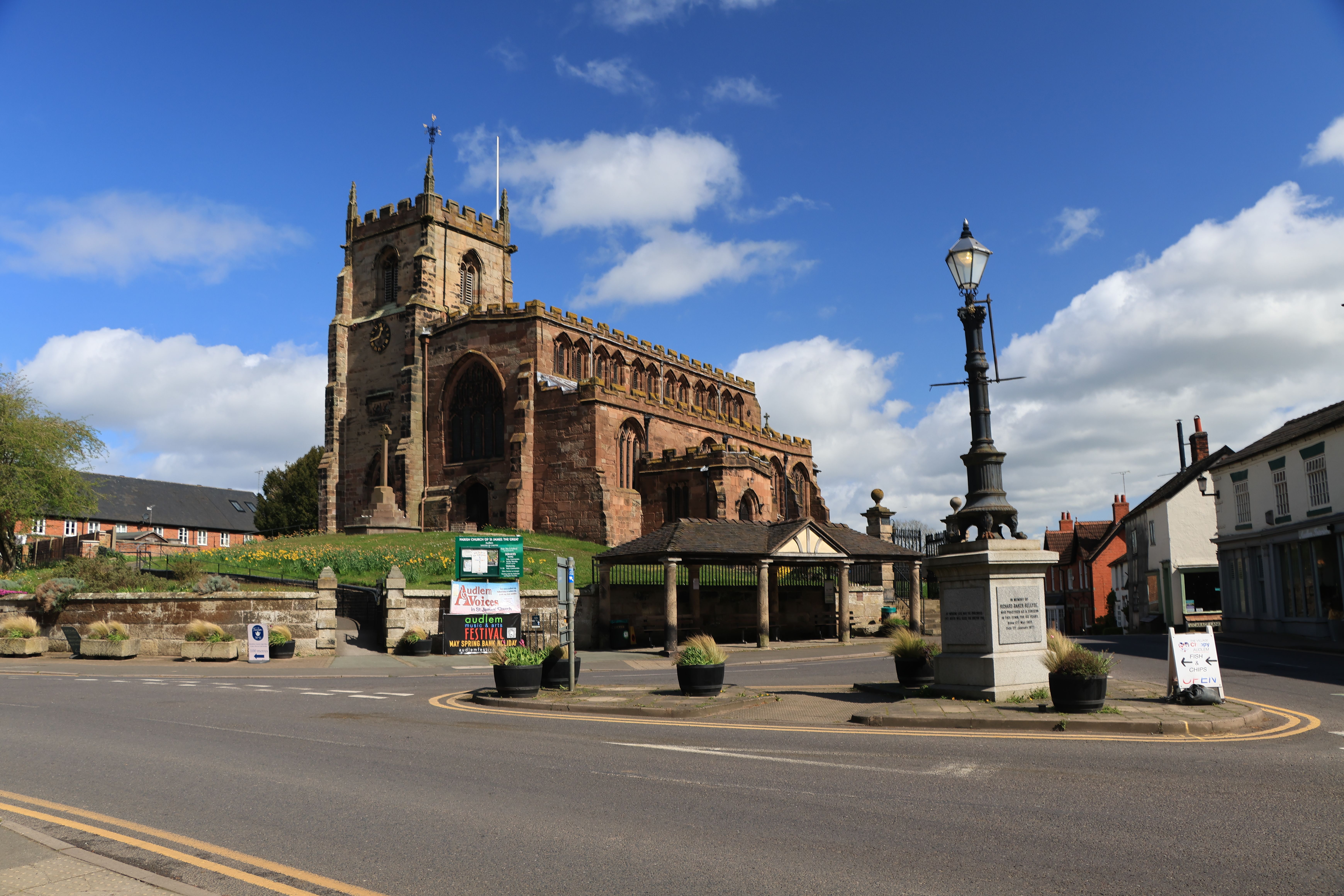 Historic English church with scenic sky, capturing cultural architecture elements and timeless charm.