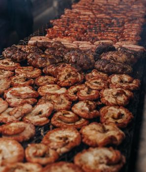 A variety of grilled meats sizzling on a barbecue in Buenos Aires, Argentina.