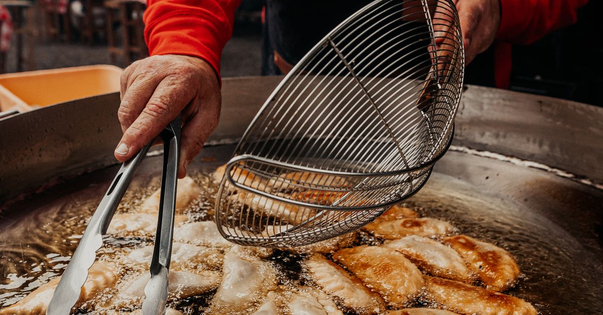 Lofoten fjord fishing village with stockfish racks