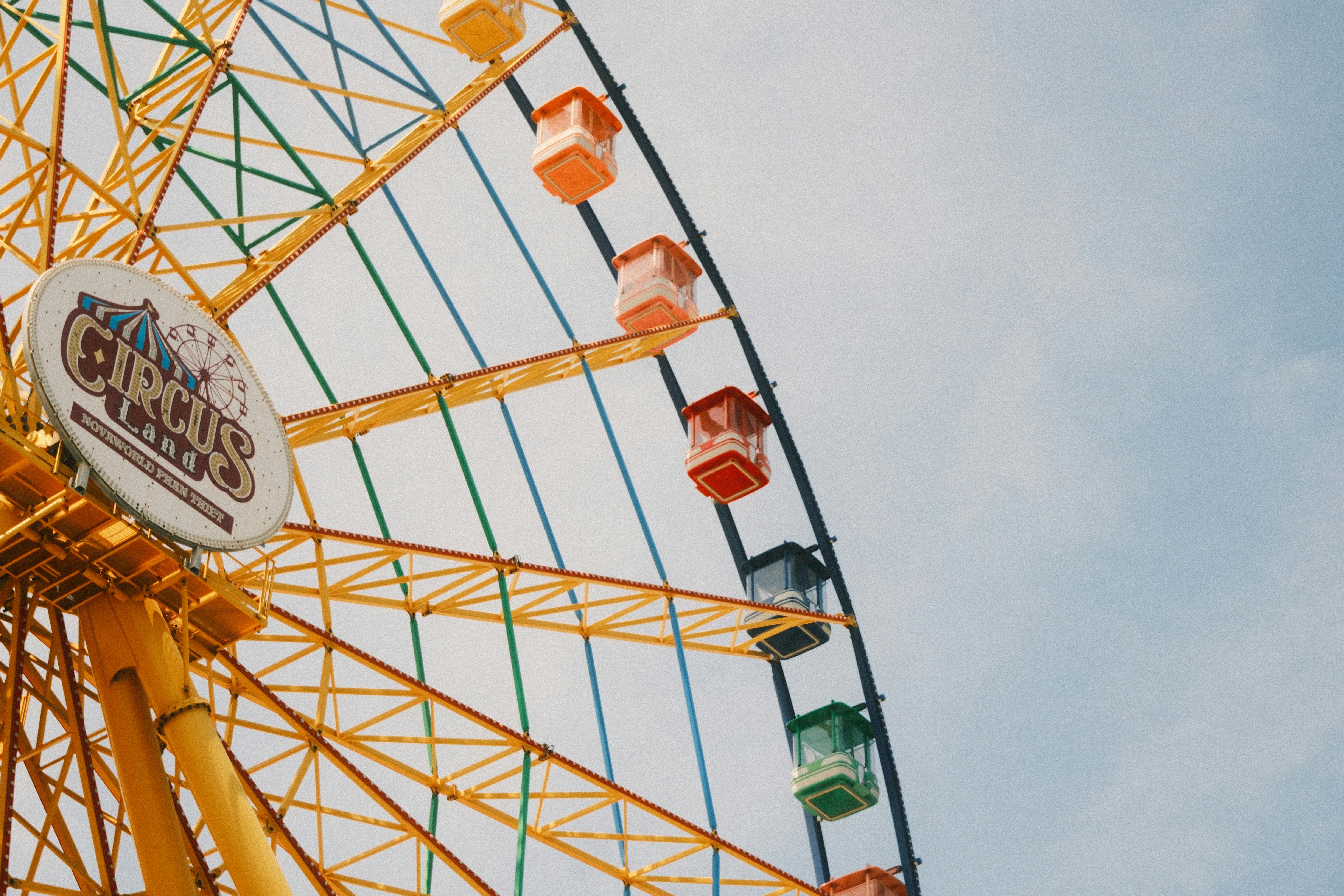 Vibrant Ferris wheel at Circus Land in Phan Thiet, Vietnam. Perfect for travel enthusiasts.