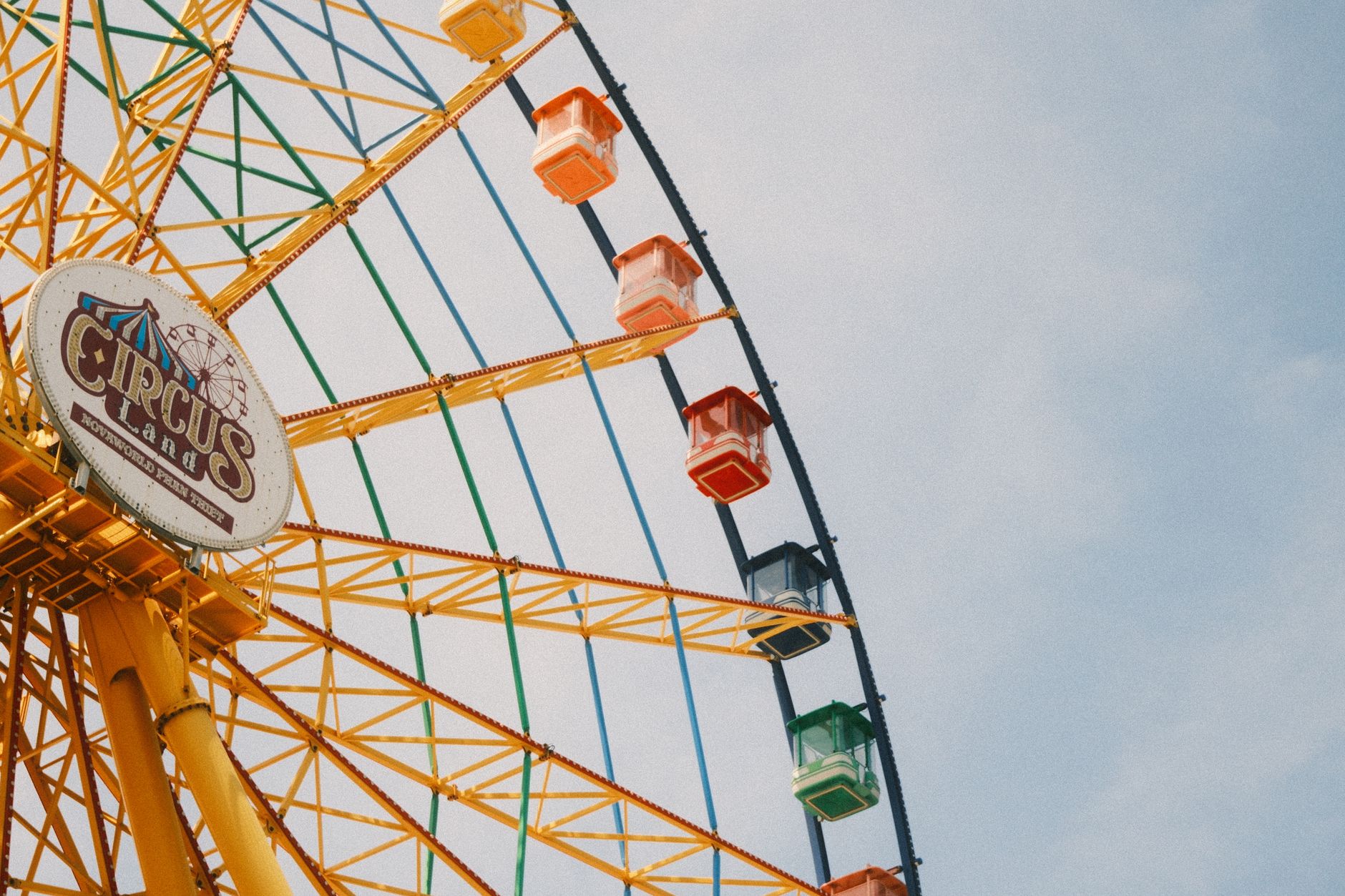 Vibrant Ferris wheel at Circus Land in Phan Thiet, Vietnam. Perfect for travel enthusiasts.