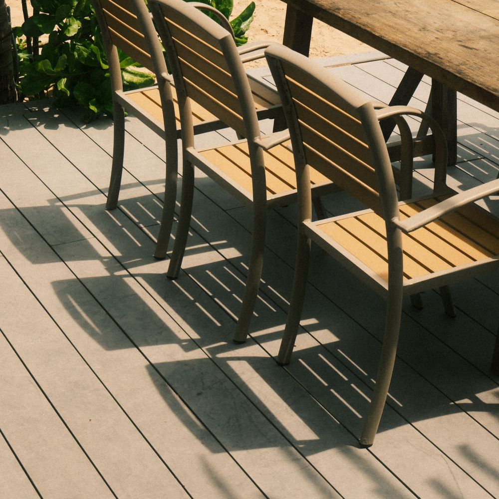 Fence and Decking Painting in Church End — clean edges cut in around trim and sockets