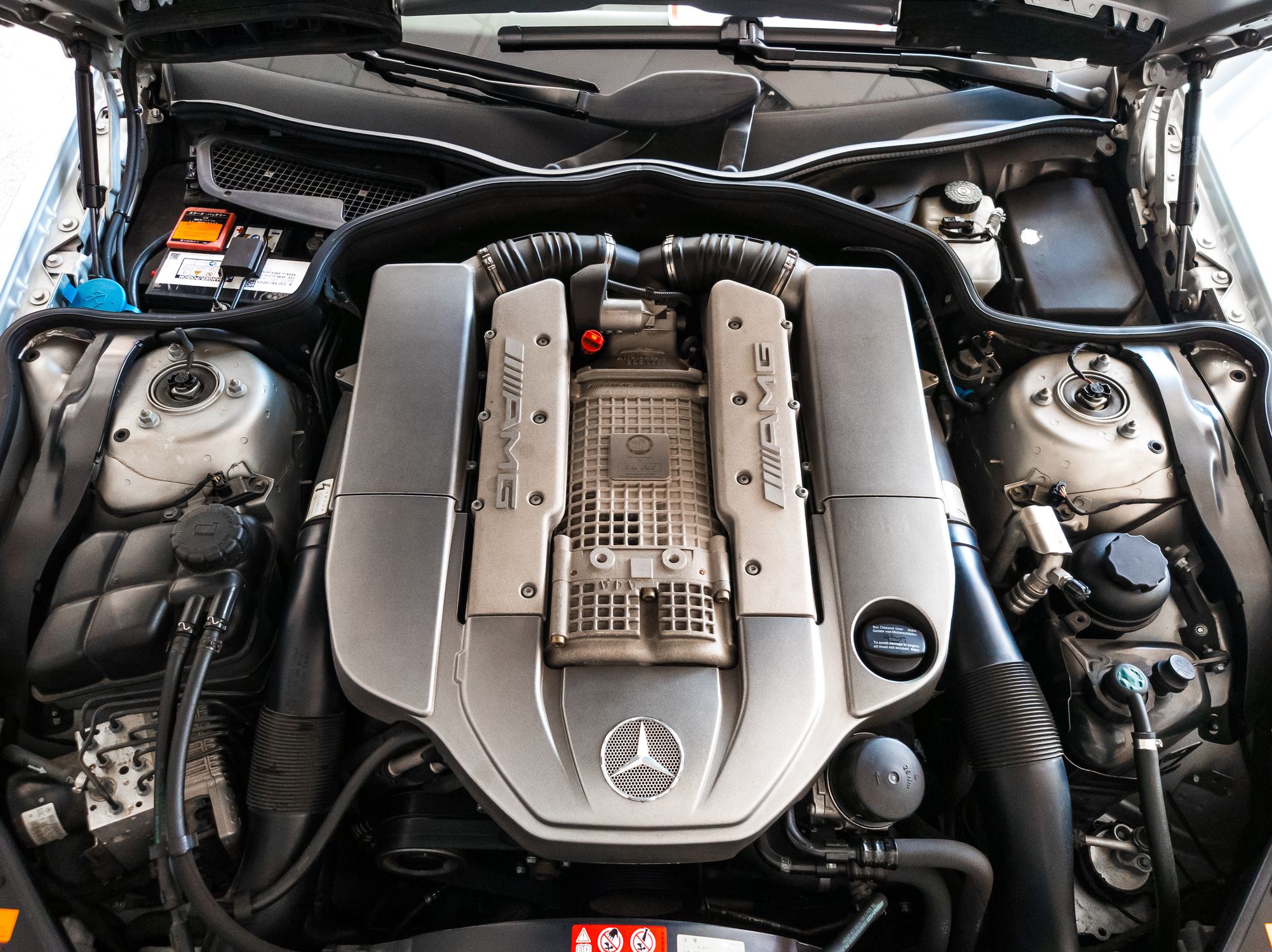 Tlb Engine Compartment Close-up of a Car Engine Compartment · Free Stock Photo