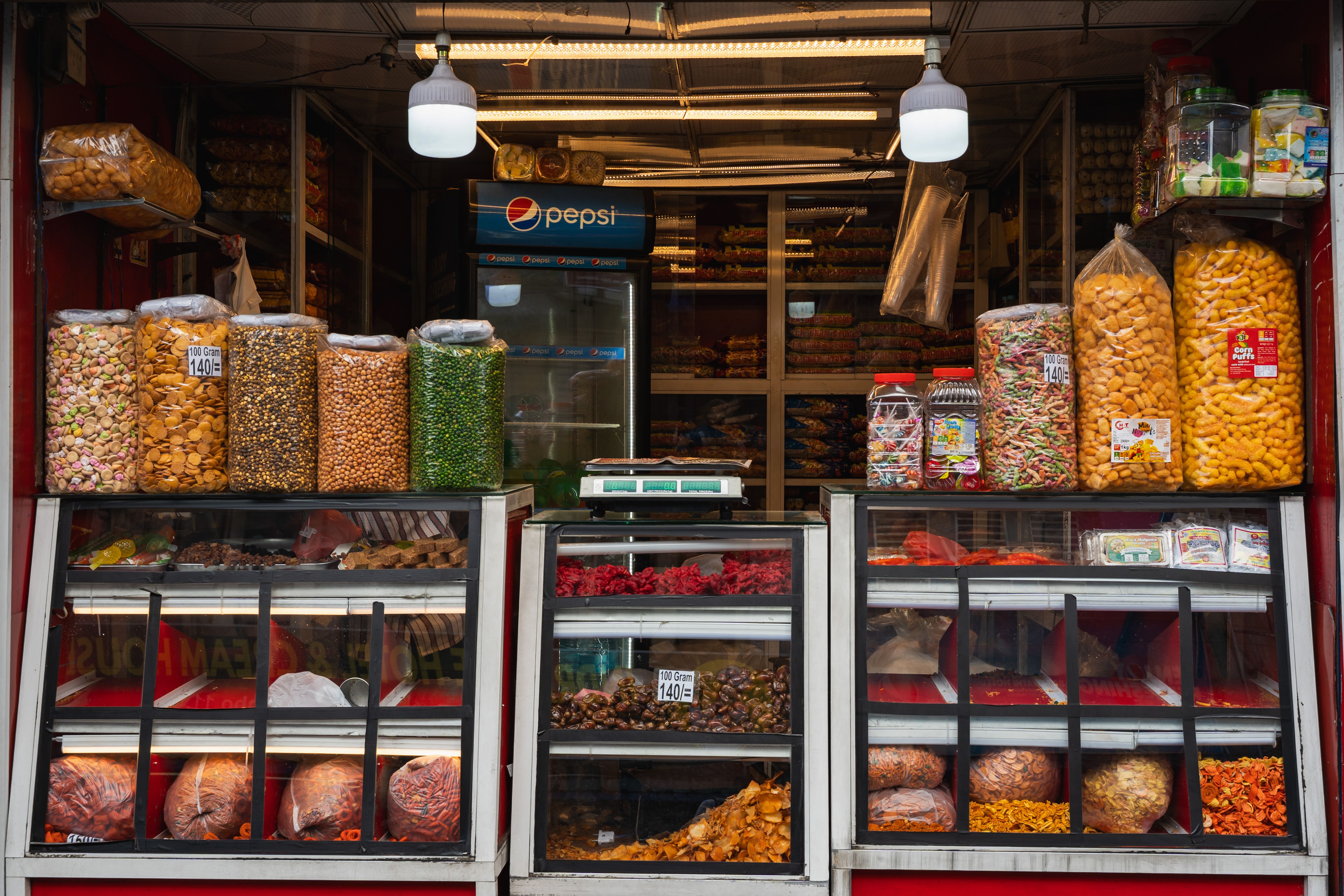 Colorful Snack Display at Street Shop in Colombo · Free Stock Photo