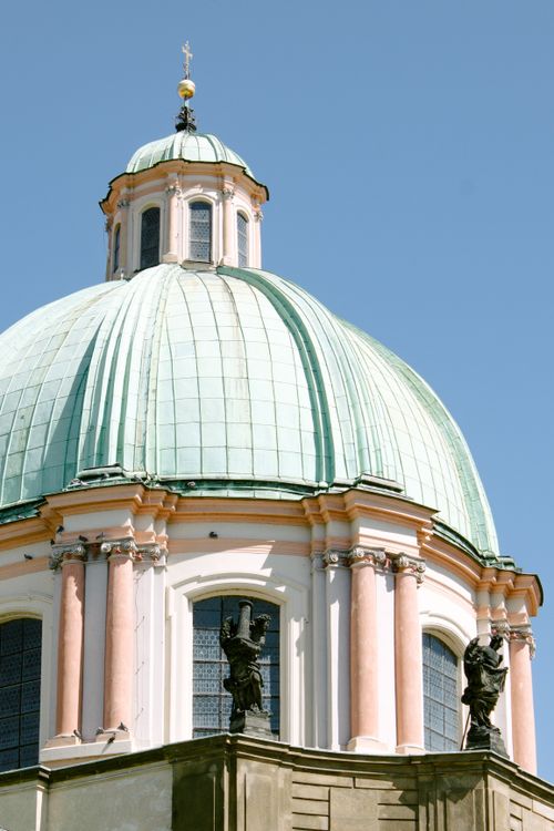 Free An architectural photo of a classic church dome with statues under a clear blue sky, capturing elegance and history. Stock Photo