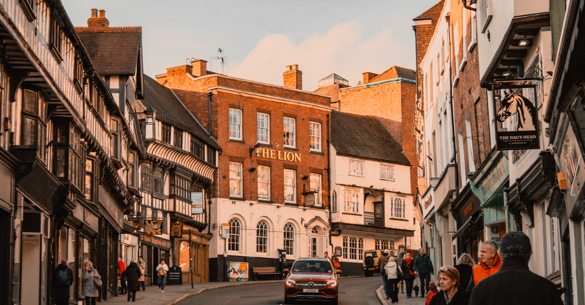 walkable suburban town center with shops and pedestrians