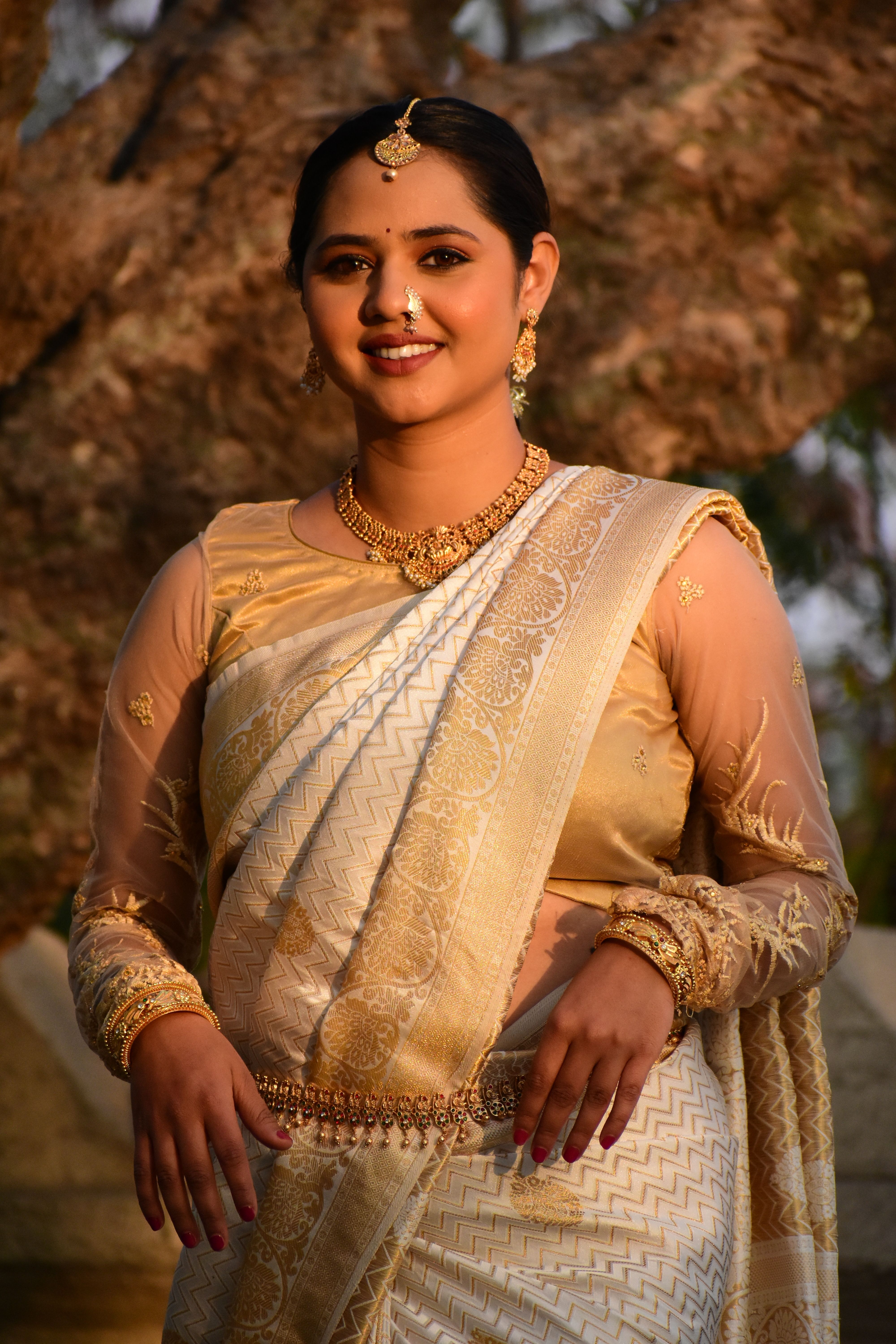 Elegant Woman in Traditional Indian Saree Outdoors · Free Stock Photo