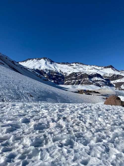 Free Stunning view of snow-covered mountains and clear blue sky, perfect for winter tourism Stock Photo